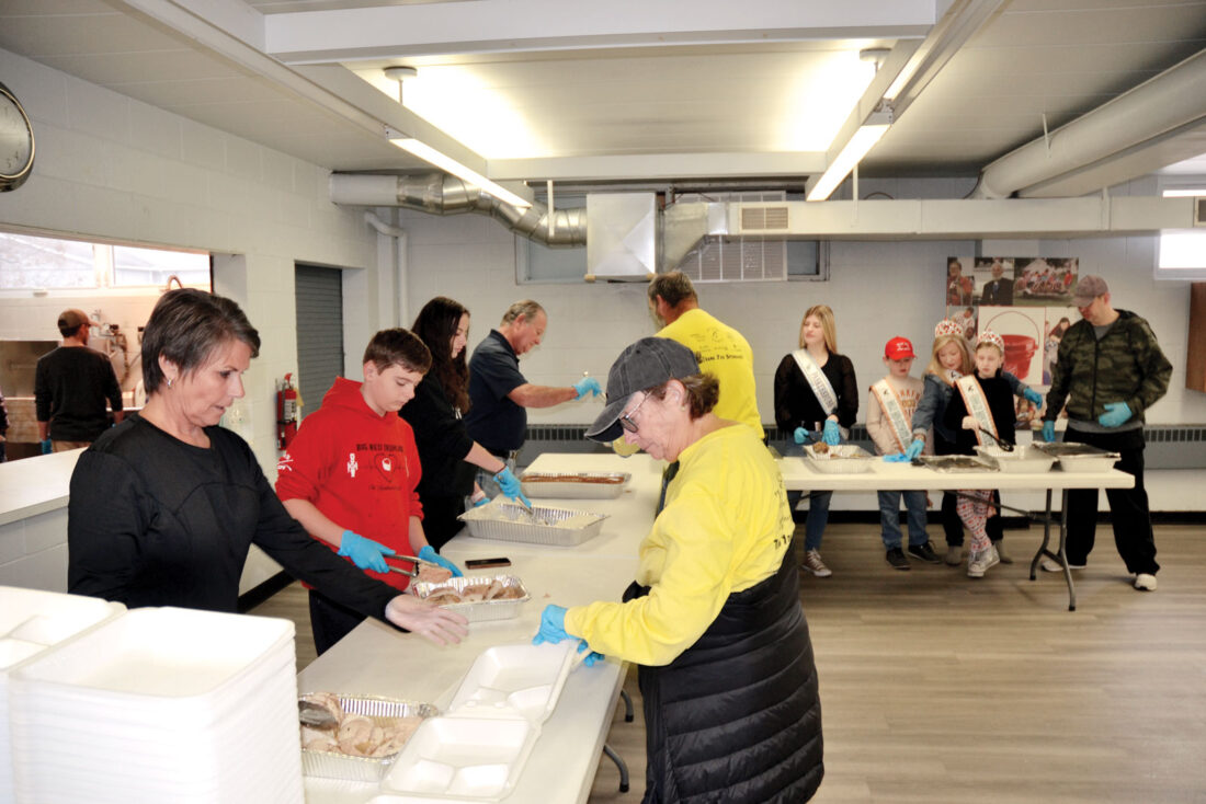 Volunteers help Salvation Army deliver Thanksgiving meals News